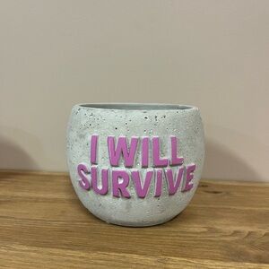 Gray Planter with Pink 'I Will Survive' Text
